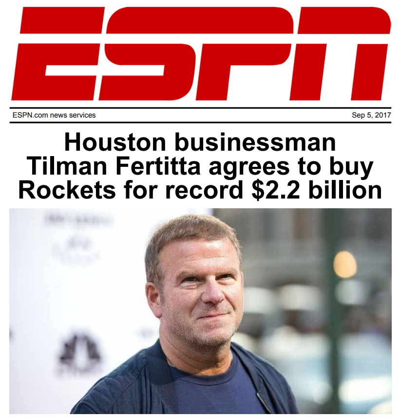 Tilman holds up his very own Houston Rockets jersey after buying the team for $2.2 billion dollars earlier this year.