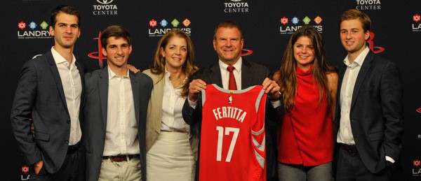 Tilman Fertita recieves a Rockets Jersey with his name on it.